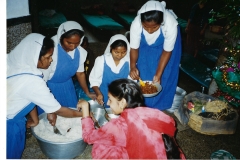 08 Nuns serving lunch Dec. 1996 (c) AliciaYoung.net